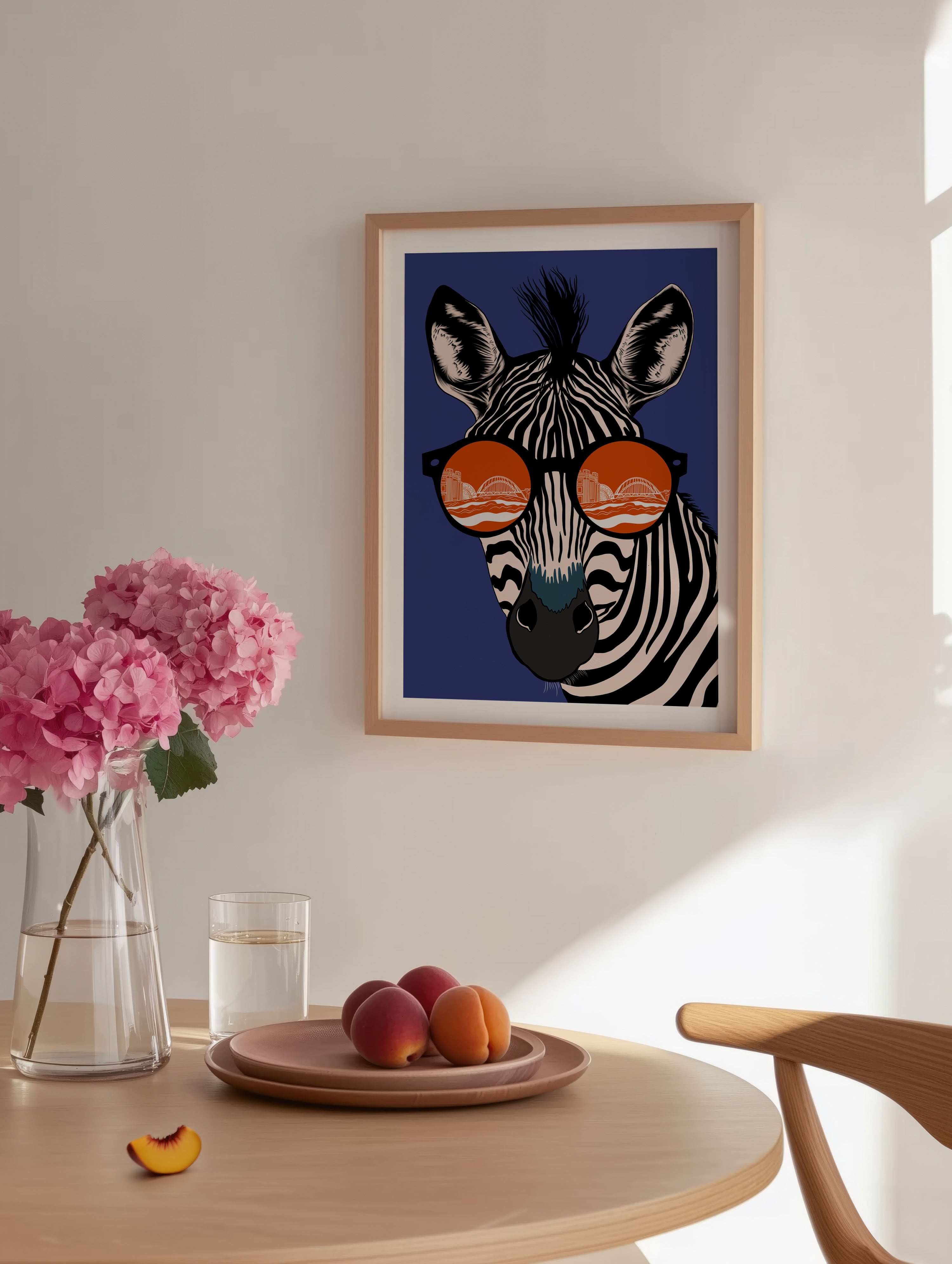 Geordie Zebra with Newcastle River Tyne in the reflection of its glasses art print. Blue and orange version frame sitting on a chair. Art print for home decor version 2.