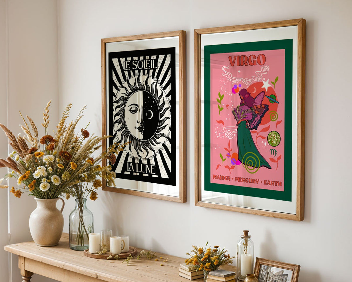 Two framed prints on a wall showing the Sun and the moon print on the right and on the left a Virgo star sign print.