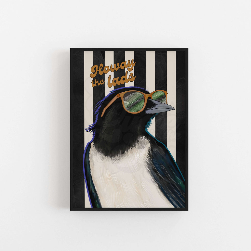 Framed artwork of a magpie wearing sunglasses with text on a striped background reading "Howay the Lads"