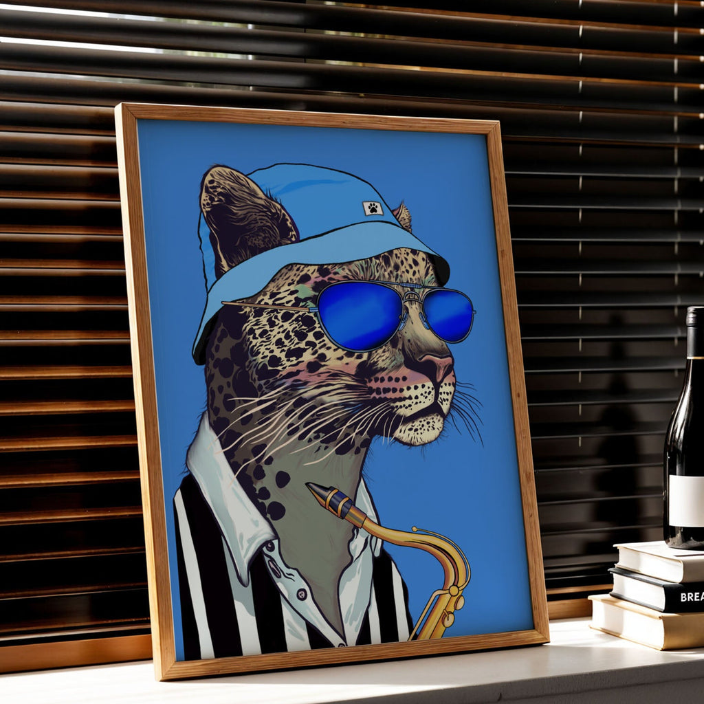 Framed artwork of a Johnny blue hat cat with his sax on a shelf with books and a bottle.