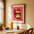 Love marmite print on the wall in a kitchen with a table and orange juice